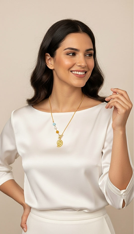 Cadena con caracol y larimar, ámbar y perla de rio