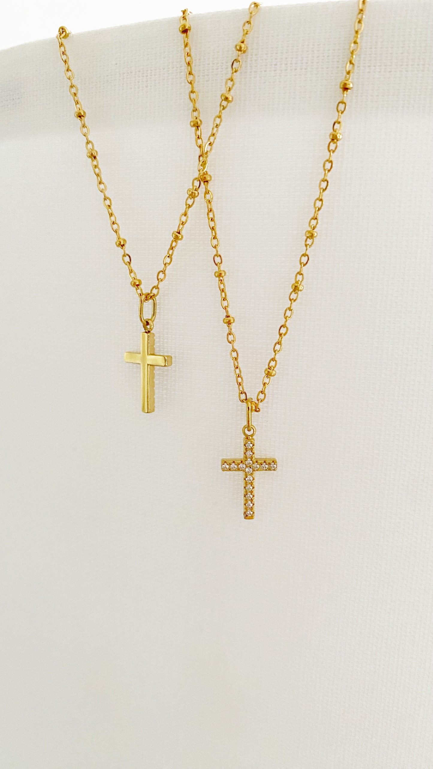 Cadena con cruz reversible
