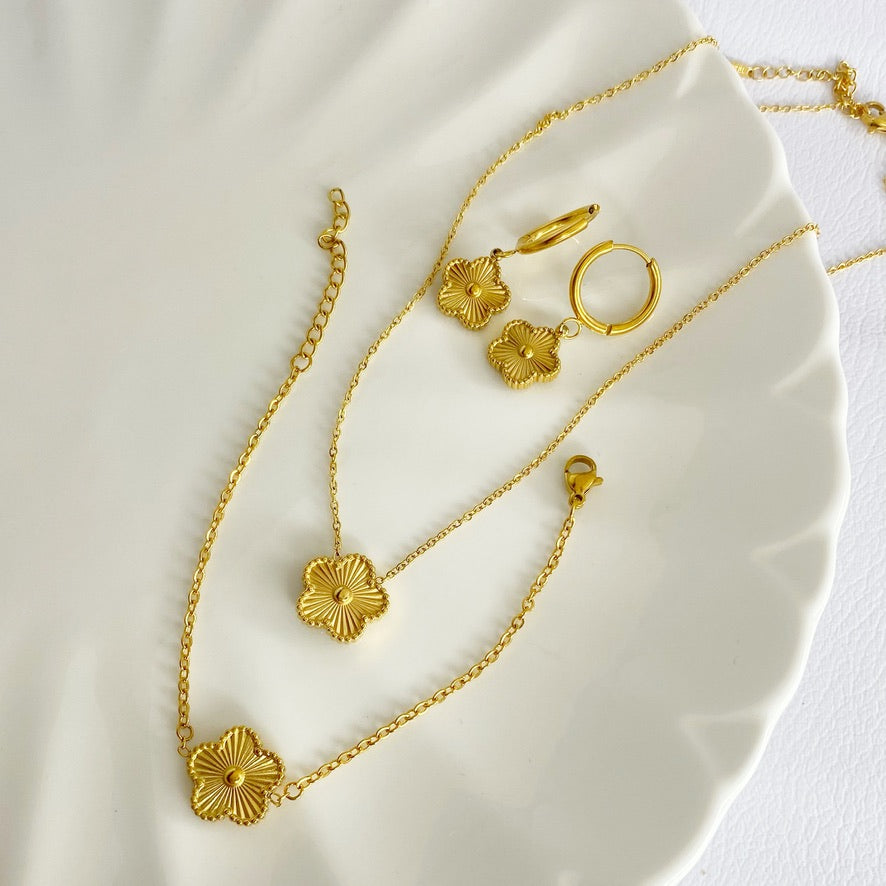 cadena flor set pulsera arete