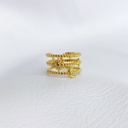 Anillo triple con luna, sol y estrellas