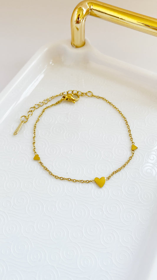 Pulsera con corazones