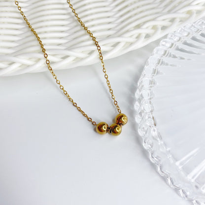 Cadena con tres bolas de acero