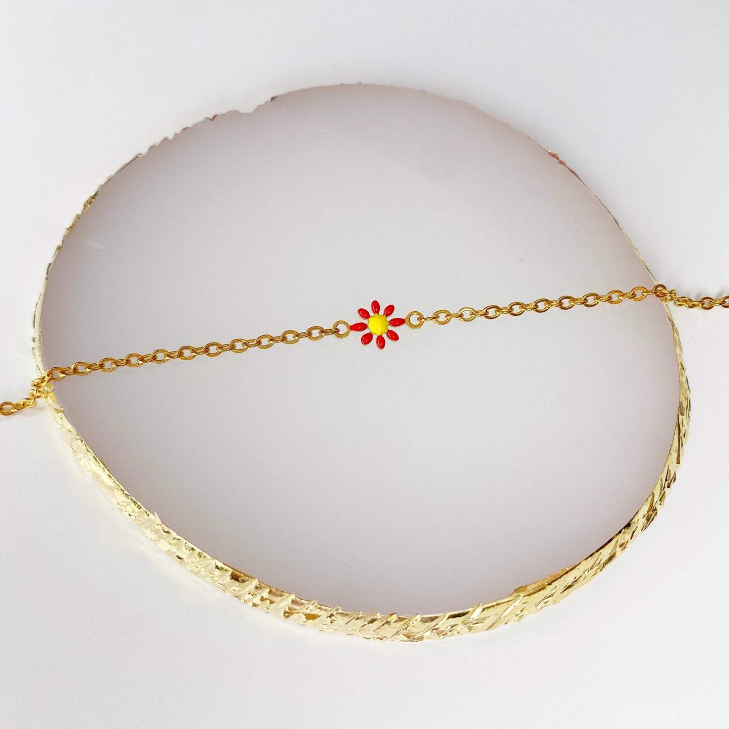 Pulsera con flor colorida