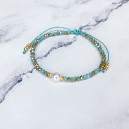 Pulsera de cristales con perla de rio