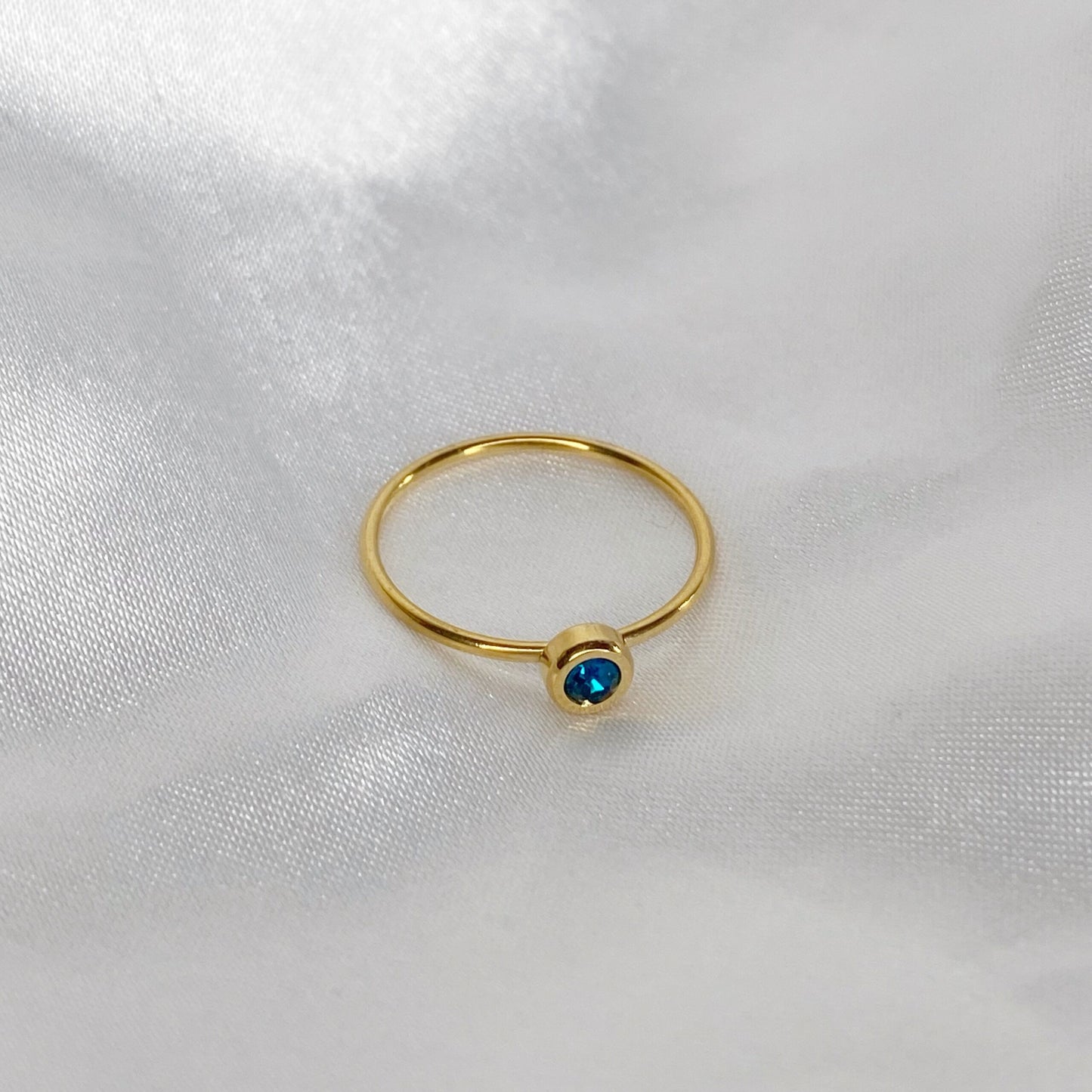 Anillo de zirconia azul