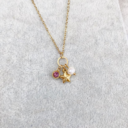 Cadena con estrella, perla y zirconia