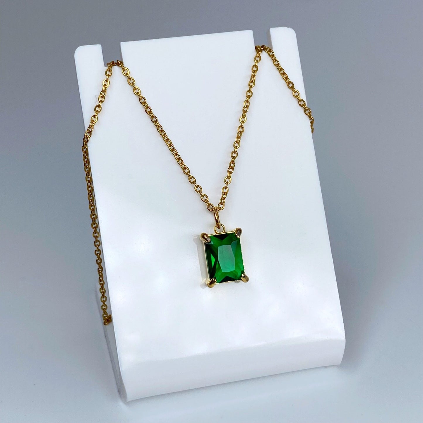 Set de zirconia rectangular esmeralda
