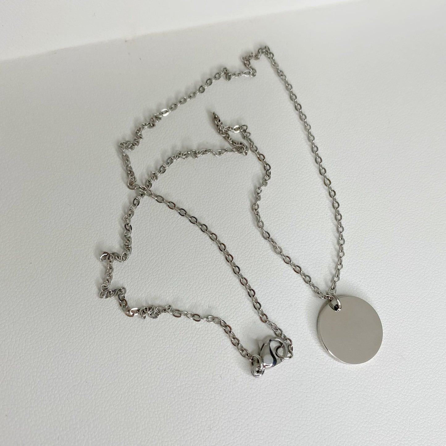 Cadena con placa redonda personalizada