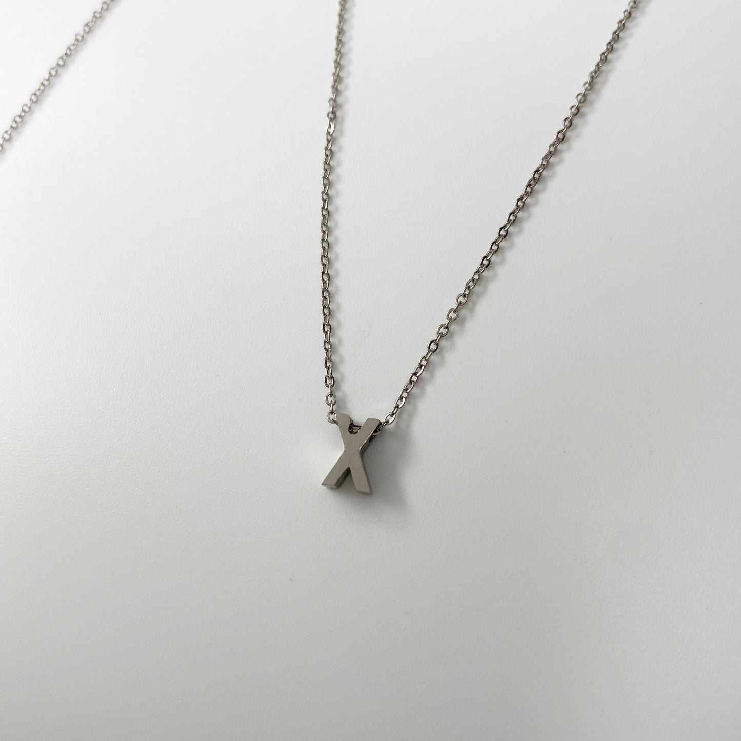 Cadena con letra pequeña
