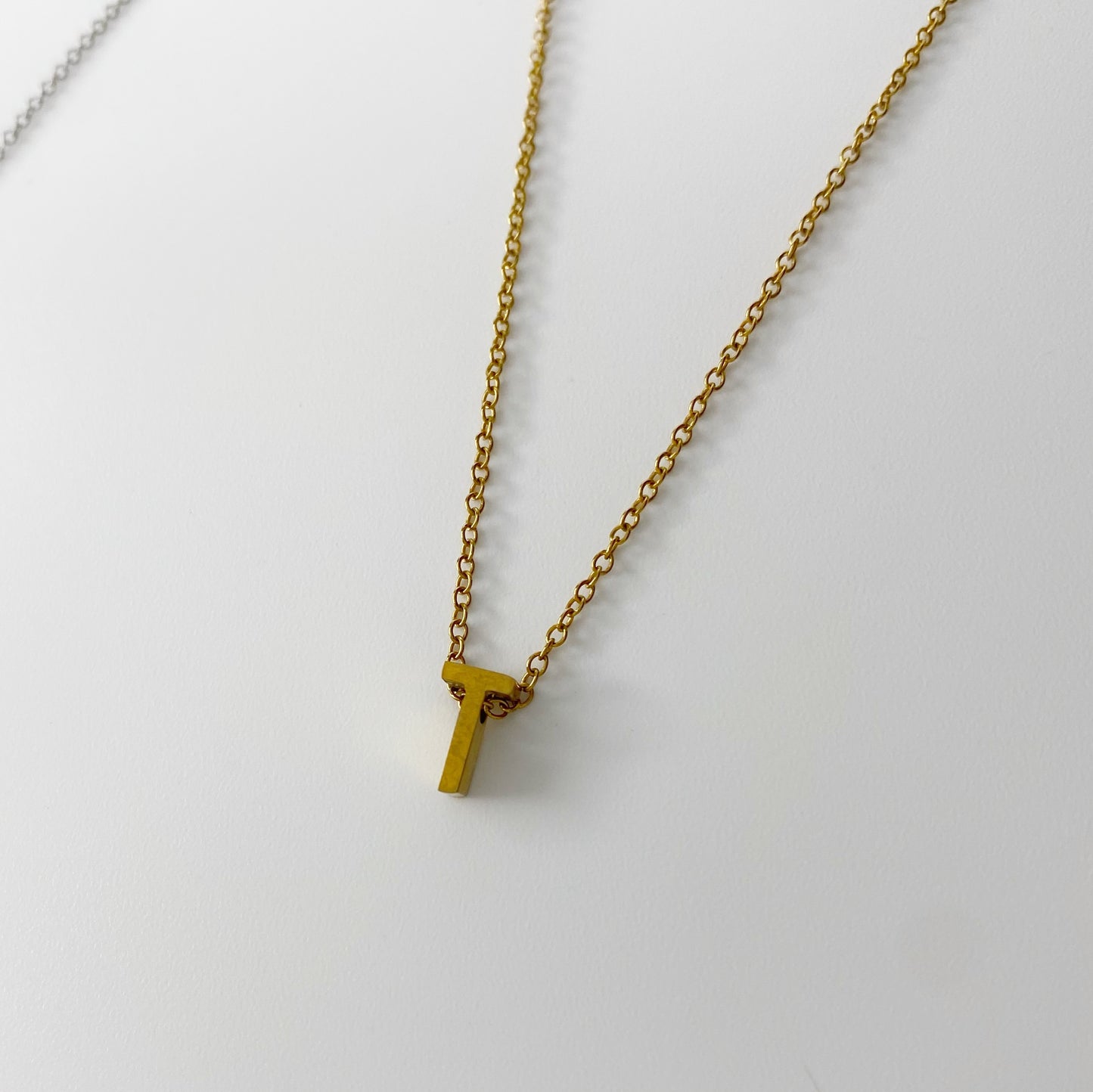 Cadena con letra pequeña