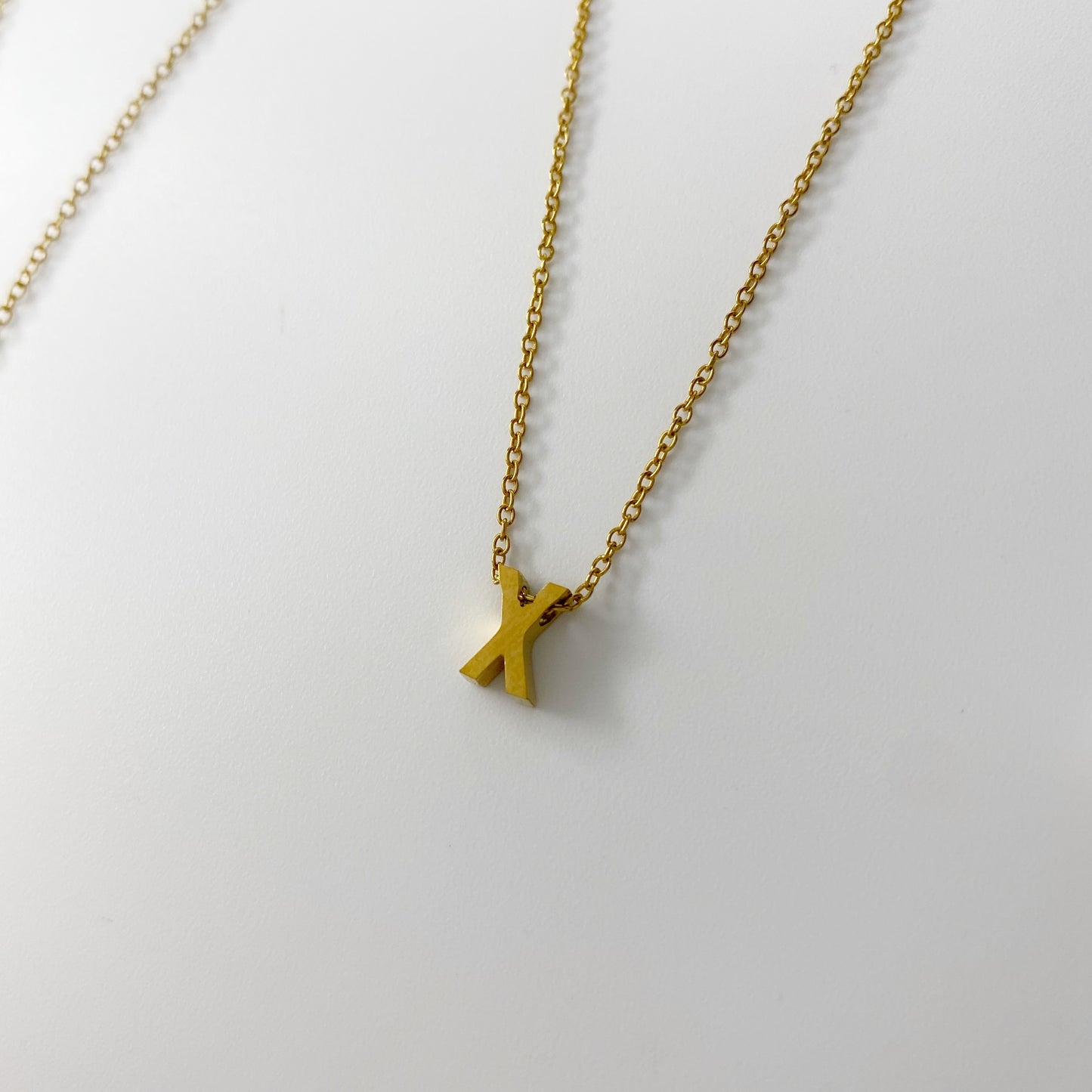 Cadena con letra pequeña