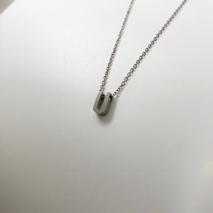 Cadena con letra pequeña