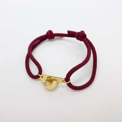 Pulsera de esposas con cordón