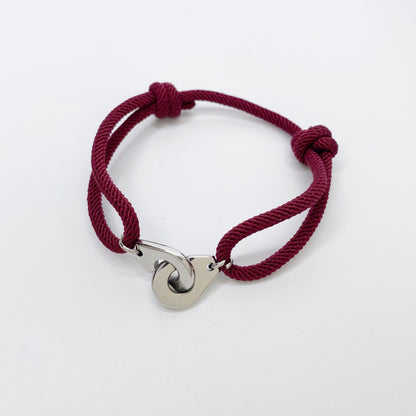 Pulsera de esposas con cordón