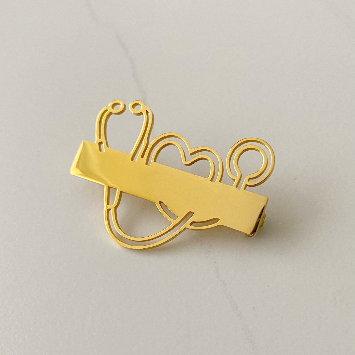 Broche médico personalizado