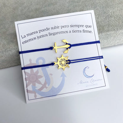 Duo de pulseras de hilo con ancla y timón