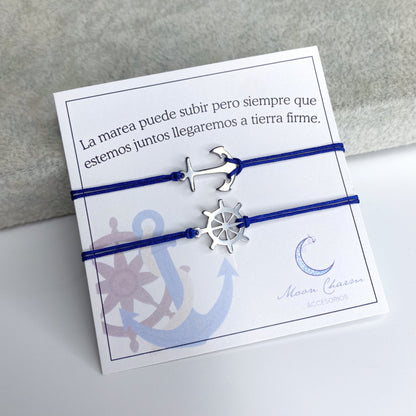 Duo de pulseras de hilo con ancla y timón
