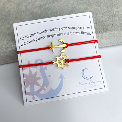 Duo de pulseras de hilo con ancla y timón