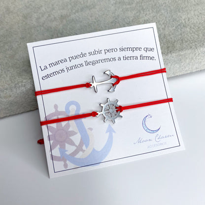 Duo de pulseras de hilo con ancla y timón