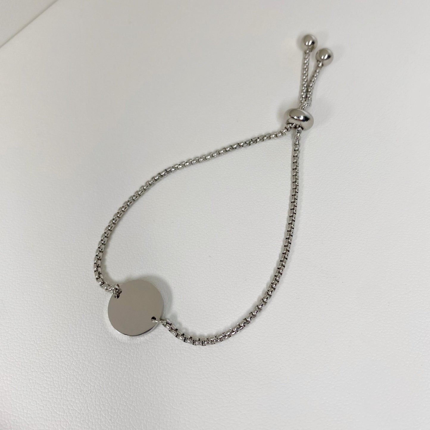 Pulsera con placa redonda personalizada