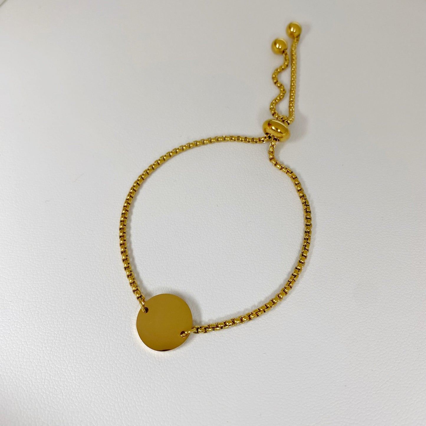 Pulsera con placa redonda personalizada