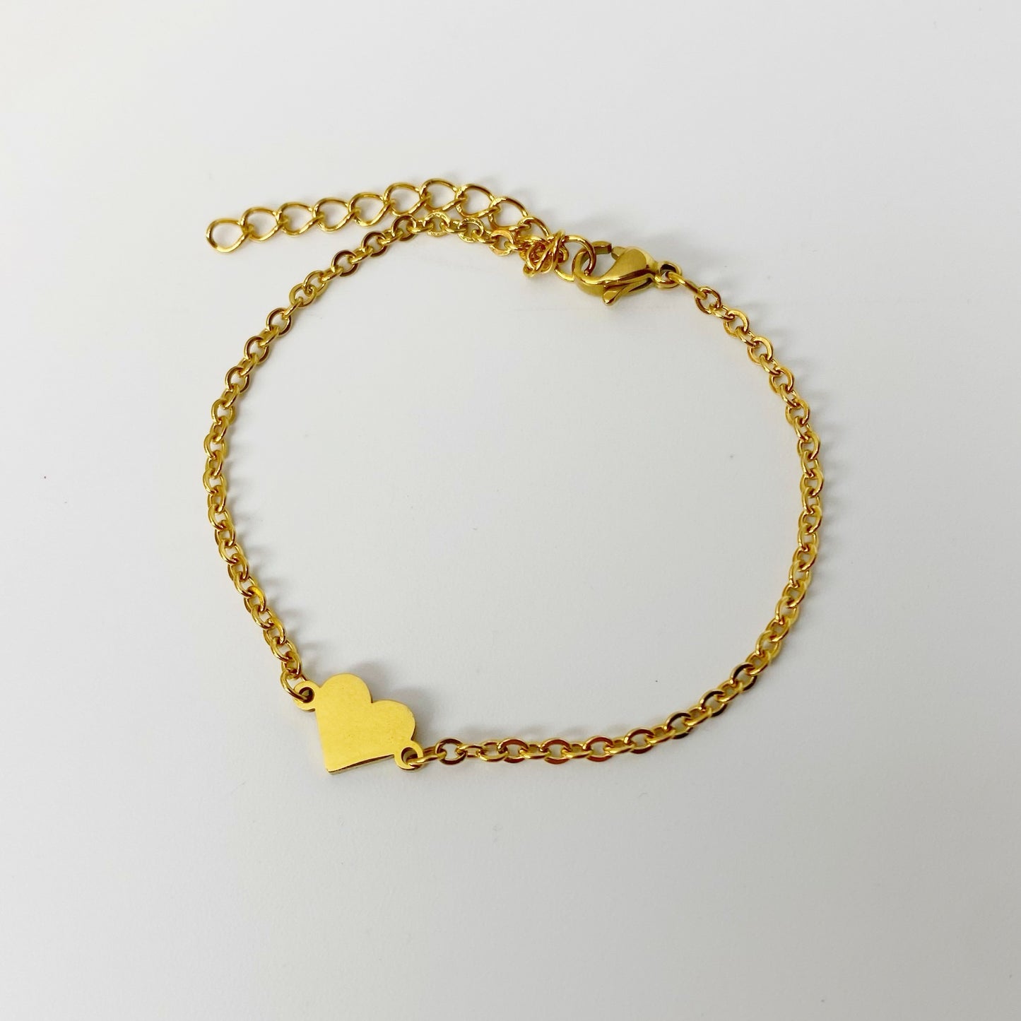 Pulsera con placa de corazón personalizado