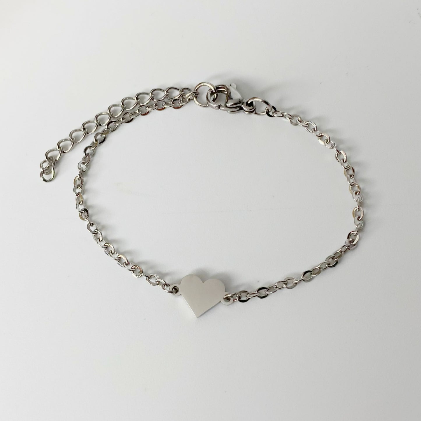 Pulsera con placa de corazón personalizado