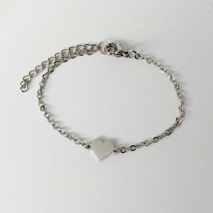 Pulsera con placa de corazón personalizado