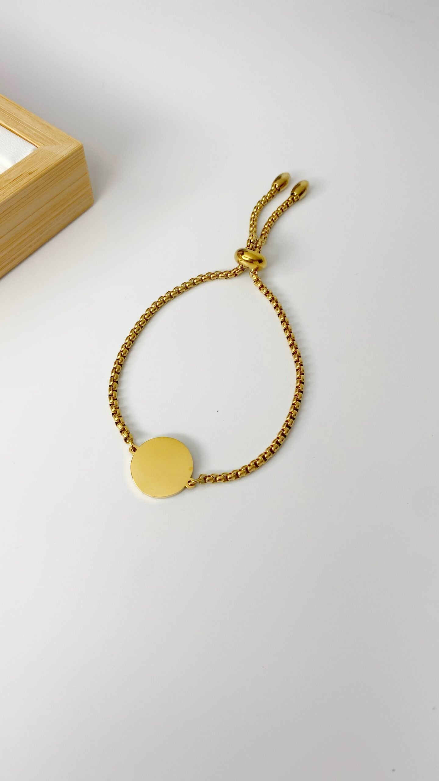 Pulsera con placa redonda personalizada